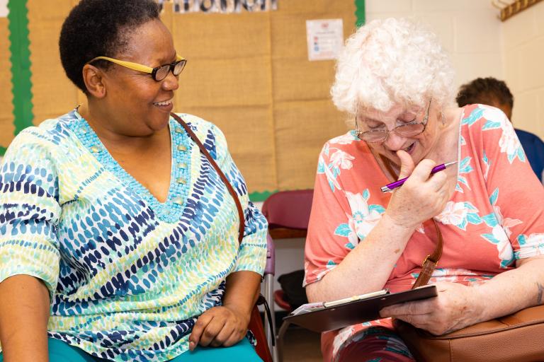 Councillor Mariam Lolavar and a pensioner