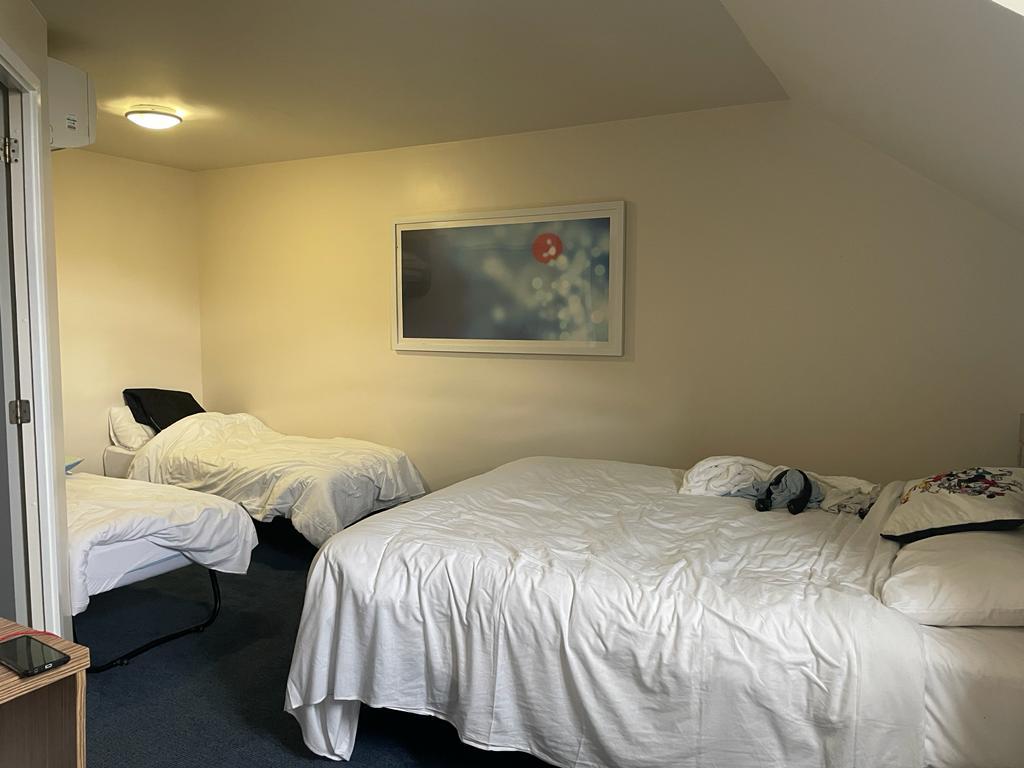 A hotel bed in a hotel used for temporary accommodation